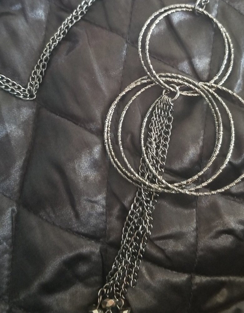 Multi-ring silver/black tassel necklace